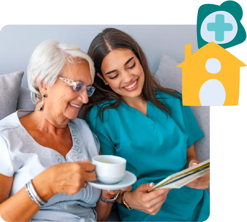 Older woman and nurse smiling on a couch